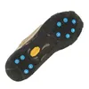 The underside of a shoe with ice cleats is shown against a white background. Anteprima dell’immagine prodotto