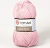 A ball of pink yarn on a white background. Podgląd zdjęcia produktu