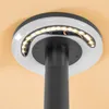 Close-up view of the top of a black outdoor solar light with LED lights. Produktbild-Vorschau