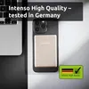 A power bank is attached to the back of a smartphone, next to a laptop. Voir les images du produit