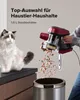 A person is emptying a vacuum cleaner's dustbin into a trash can, with a cat sitting nearby. Produktbild-Vorschau