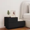 A black nightstand with a framed picture and a potted plant on top, placed next to a bed. Náhled obrázku produktu