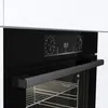 A close-up view of the control panel and handle of a black oven. Voir les images du produit