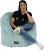 A woman sits on a beanbag chair. Náhľad obrázku produktu