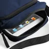 A close-up view of a navy blue bag with a tablet inside. Anteprima dell’immagine prodotto
