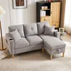 A light gray sectional sofa with a chaise lounge is shown in a living room setting. Náhľad obrázku produktu