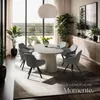 A dining room scene with a table and chairs, plants, and a sideboard. Náhled obrázku produktu