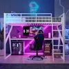 A loft bed with a desk underneath, set up as a gaming station with a computer, chair, and neon lighting. Voir les images du produit