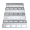 A set of five stainless steel grill heat plates stacked on top of each other against a white background. Produktbild-Vorschau
