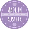 A circular graphic with the text 'MADE IN AUSTRIA' and decorative hearts. Produktbild-Vorschau