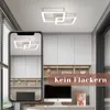 A modern office or living space with a ceiling light and a desk setup. Produktbild-Vorschau
