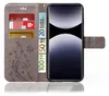 A grey flip phone case with card slots and a floral design, shown open with a phone inside. Produktbild-Vorschau