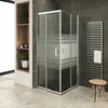 A modern bathroom with a shower cabin, shelves, and a towel rack. Produktbild-Vorschau