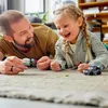 A father and daughter are playing with LEGOs on the floor. Náhled obrázku produktu