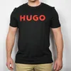 A person wearing a black t-shirt with a red logo. Produktbild-Vorschau