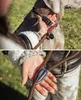 A person is holding a dog leash near a dog's neck and then a close-up of the leash. Anteprima dell’immagine prodotto