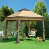 A gazebo set up on a lawn with chairs and decorative items. Produktbild-Vorschau