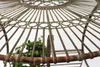 Close-up view of the top of a metal garden table with a decorative pattern. Produktbild-Vorschau
