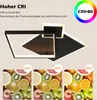 A modern black LED ceiling light with geometric shapes, presented with text highlighting its high CRI and color rendering capabilities, alongside three smaller images of fruit under different CRI conditions. Produktbild-Vorschau