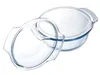 A clear glass casserole dish with its lid slightly ajar, set against a white background. Produktbild-Vorschau