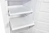 Inside of a white refrigerator or freezer with two empty shelves. Produktbild-Vorschau