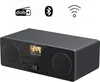 A black HAMA radio with a small screen and speakers, shown from a slightly elevated front-left angle. Three icons representing DAB+, Bluetooth, and Wi-Fi are displayed above the radio. Produktbild-Vorschau