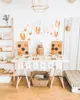 A decorated table with donuts and cake for a party. Anteprima dell’immagine prodotto