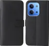 A black flip-style phone case shown open, revealing the inside and the back of a phone with a camera module. Produktbild-Vorschau