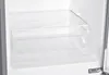 Close-up view of an empty clear plastic drawer inside a refrigerator. Produktbild-Vorschau