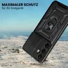 A black phone case with a ring holder is shown in a snowy, outdoor environment. Produktbild-Vorschau