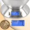 A close-up of a digital kitchen scale with a stainless steel bowl and a blue LCD display showing weight and temperature. Produktbild-Vorschau