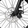 A close-up view of a bicycle's front wheel brake system. Produktbild-Vorschau