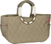 A beige quilted tote bag with silver and gray handles. Náhľad obrázku produktu