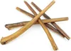 Several dog chew sticks are arranged in a pile on a white background. Podgląd zdjęcia produktu
