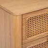 A close-up view of a wooden cabinet with rattan drawer fronts. Podgląd zdjęcia produktu
