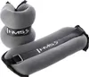 A pair of gray ankle weights with black straps and a logo. Voir les images du produit