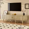 A TV stand with a TV mounted above it, in a living room setting. Anteprima dell’immagine prodotto