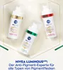 Three bottles of NIVEA LUMINOUS630® serum are arranged diagonally on a light background with decorative gold lines. Anteprima dell’immagine prodotto