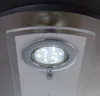 A close-up view of a modern ceiling light fixture with multiple LED lights. Náhled obrázku produktu