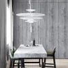 A dining table set in a modern room with a wood-paneled wall and curtains. Náhľad obrázku produktu