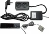 A product shot of an electronic humidity control device with its accessories. Produktbild-Vorschau
