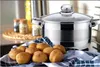 A pot and potatoes on a kitchen counter. Voir les images du produit