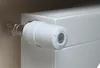 A close-up shot of a white radiator valve with a digital display showing '20°'. Produktbild-Vorschau