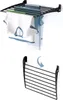 A wall-mounted drying rack shown in use with laundry and then shown folded. Voir les images du produit