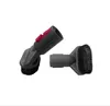 Two vacuum cleaner attachments, likely brush heads, are displayed against a white background. One is angled towards the viewer, while the other is positioned to its right, facing away. Produktbild-Vorschau