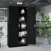 A black metal filing cabinet is shown in an office setting with plants. Voir les images du produit