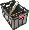 A black plastic tool crate with a spirit level, red cords, and two orange-handled tools inside, set against a white background. Voir les images du produit