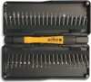 A toolset with multiple bits and a handle, laid out in a black case. Voir les images du produit