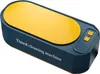 A product shot of a blue and yellow ultrasonic cleaning machine. Produktbild-Vorschau