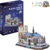 A 3D puzzle of Notre Dame Cathedral with LED lights, shown with its packaging. Produktbild-Vorschau